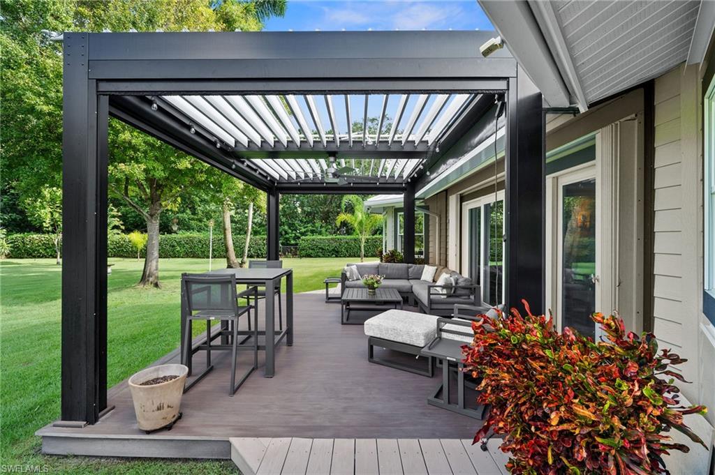 153 West Street Naples, FL 34108 - Photo 40 of 48 a view of porch with seating space