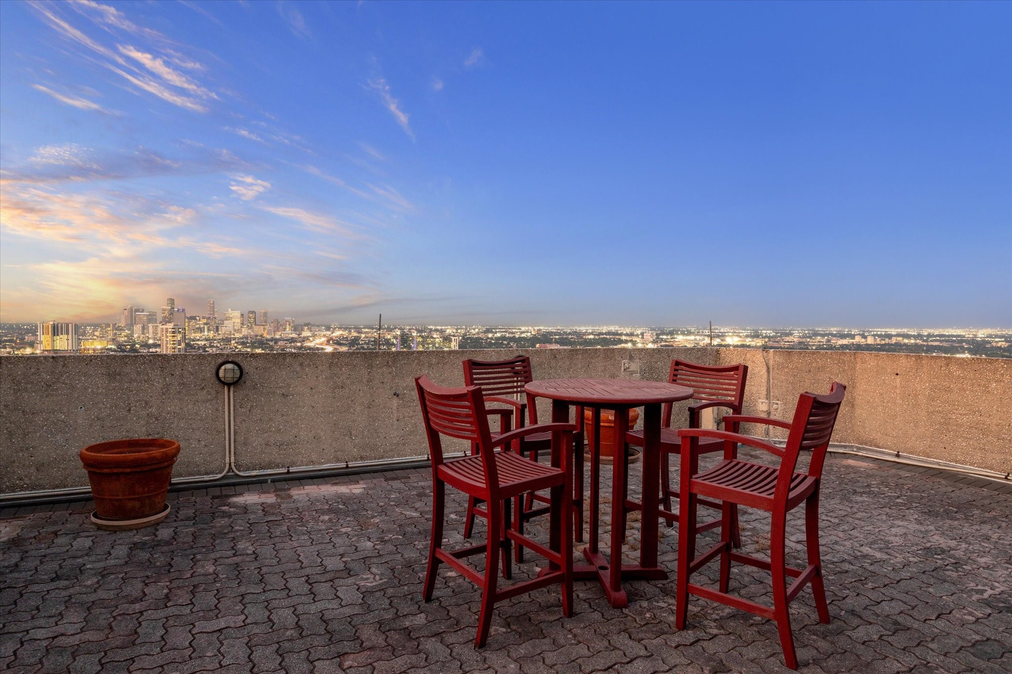 2001 Holcombe Boulevard, Unit 4006 Houston, TX 77030 - Photo 23 of 31 a view of a terrace with furniture and stove