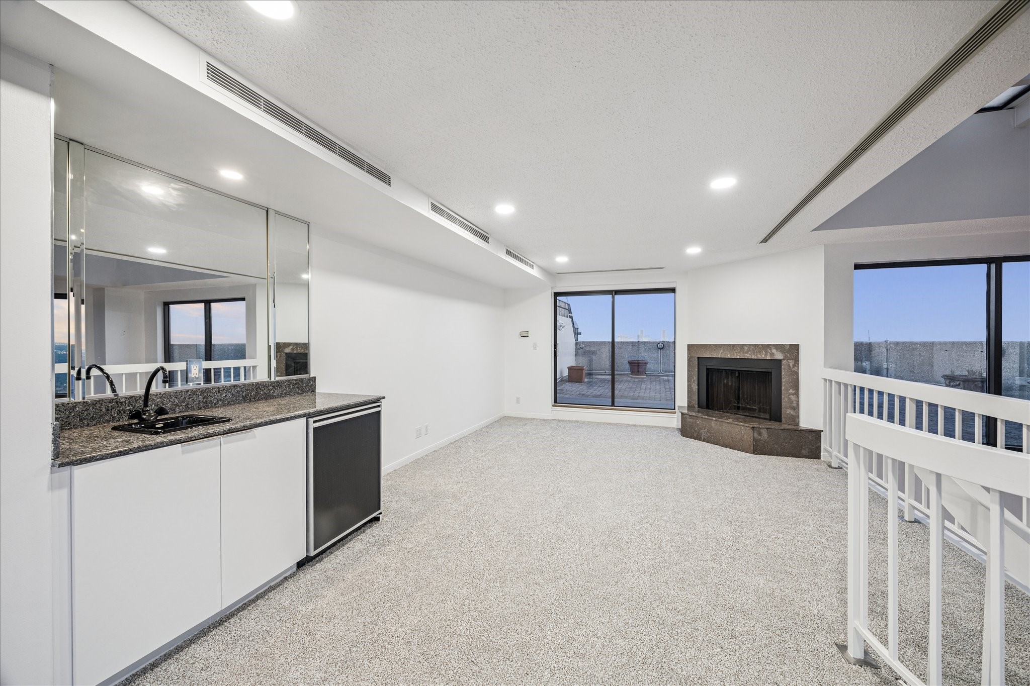 2001 Holcombe Boulevard, Unit 4006 Houston, TX 77030 - Photo 9 of 31 a kitchen with stainless steel appliances granite countertop a sink and stove top oven