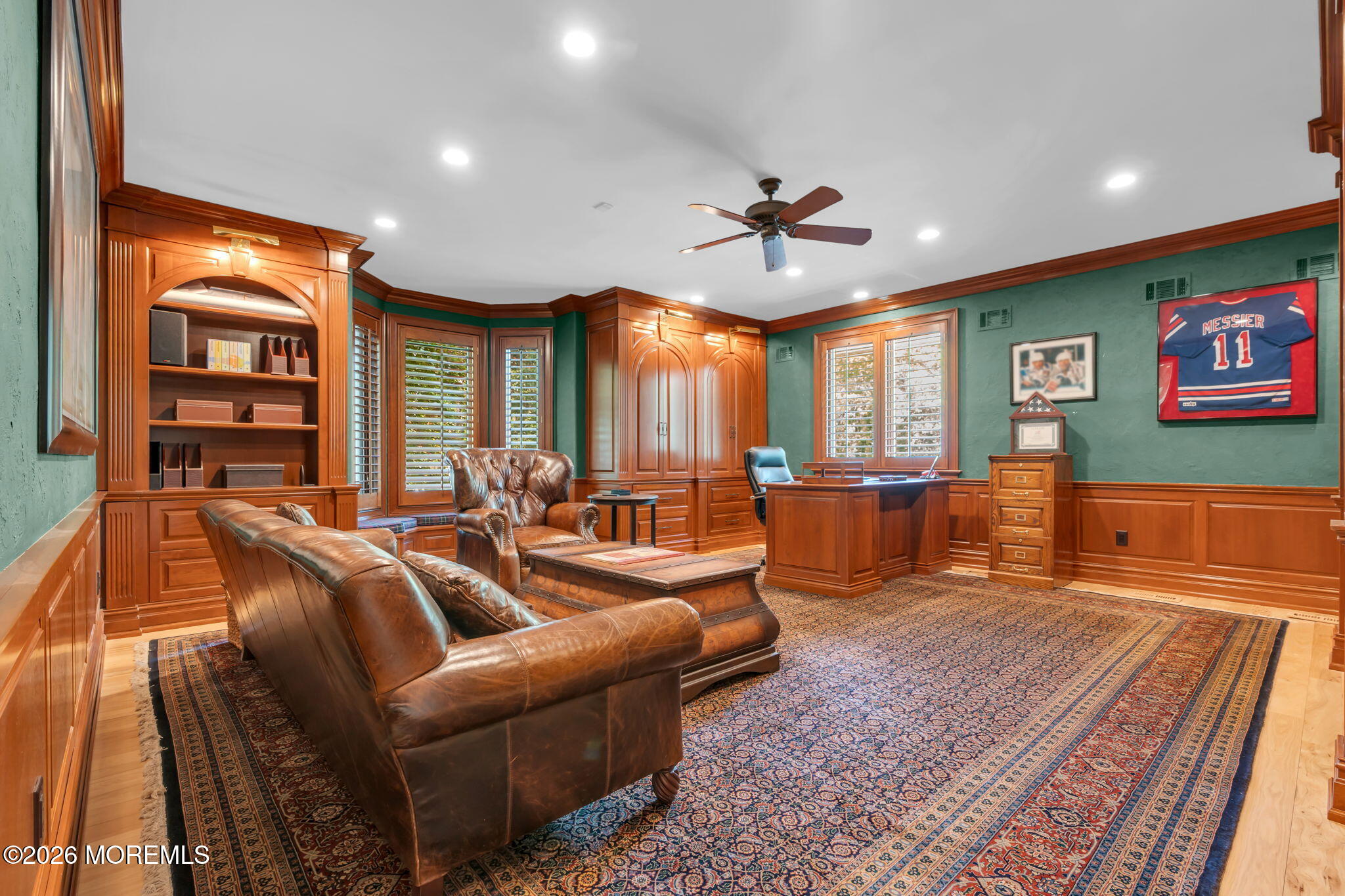 672 Winding River Road Brick, NJ 08724 - Photo 34 of 111 a living room with furniture a ceiling fan and a rug