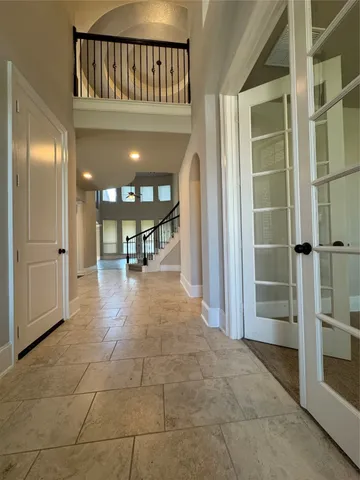 a view of a hallway with a living room