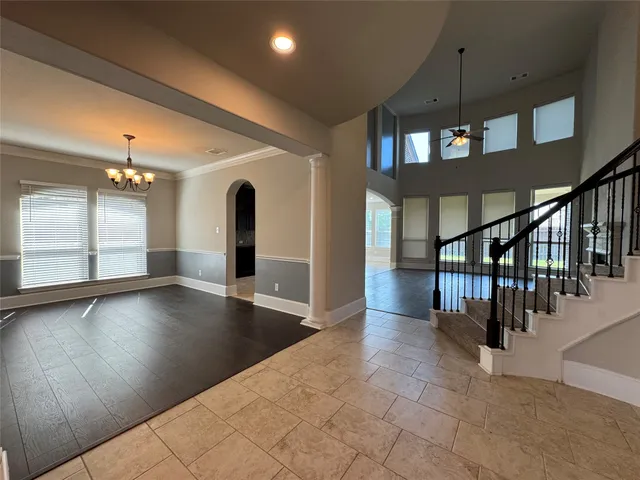 a view of a hallway with seating area