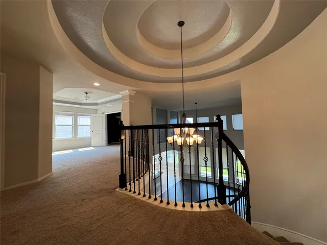 a view of staircase and a projector