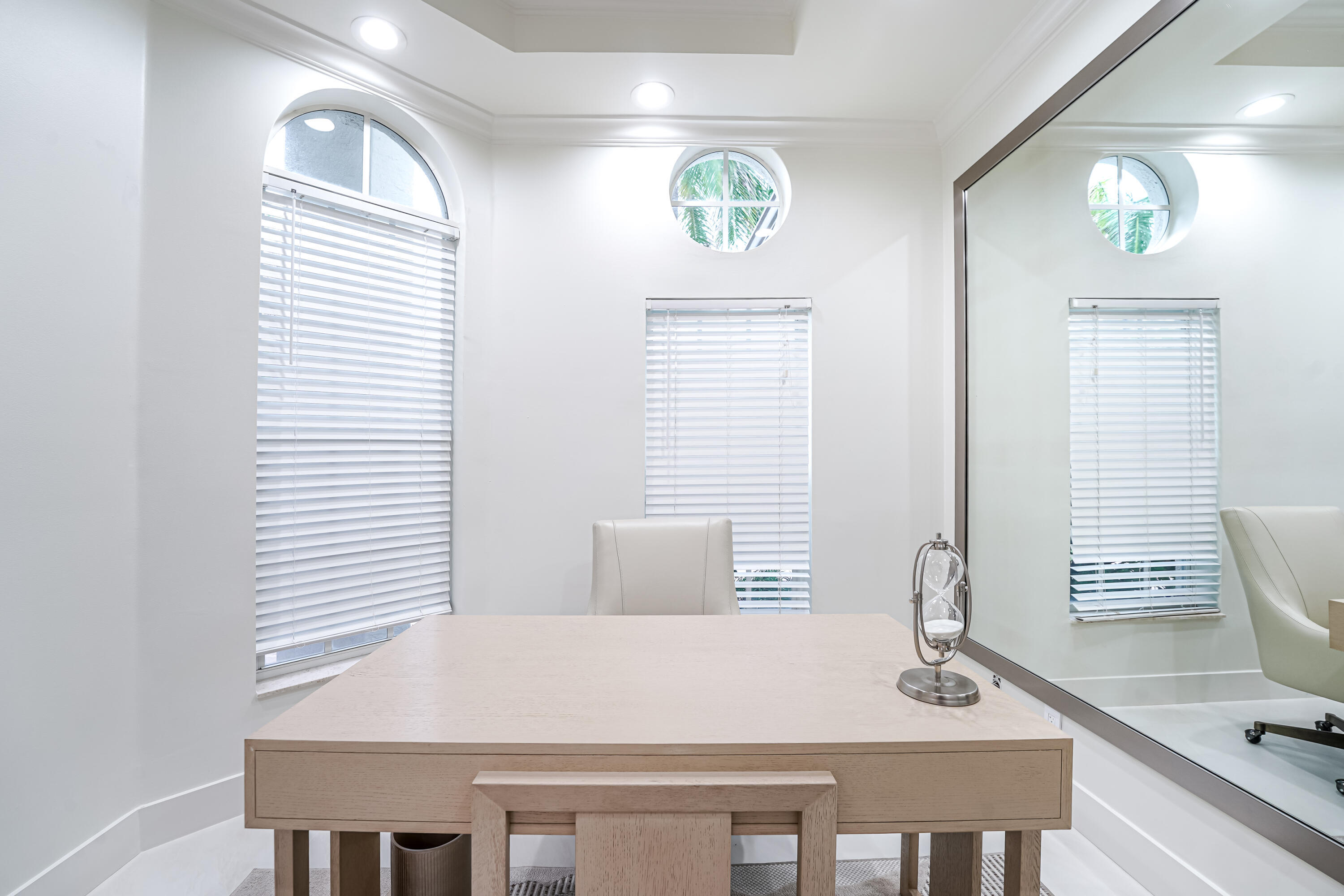 749 Northeast 71st Street Boca Raton, FL 33487 - Photo 16 of 43 a view of a dining room with a table and chairs