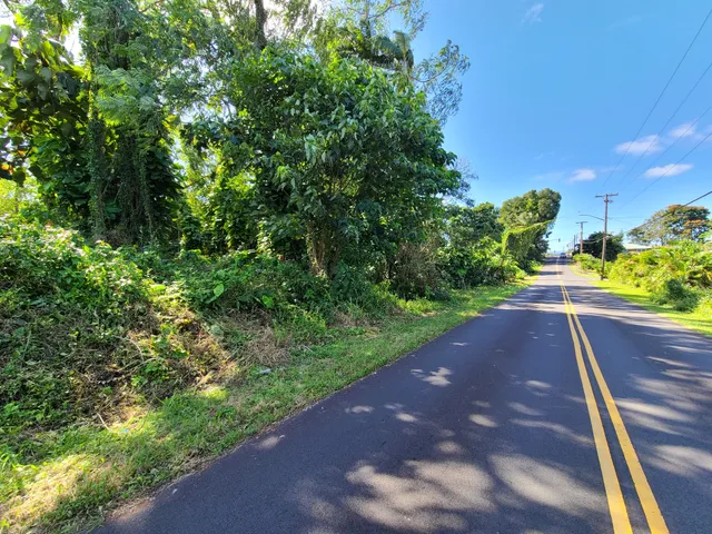 a view of a street with a house
