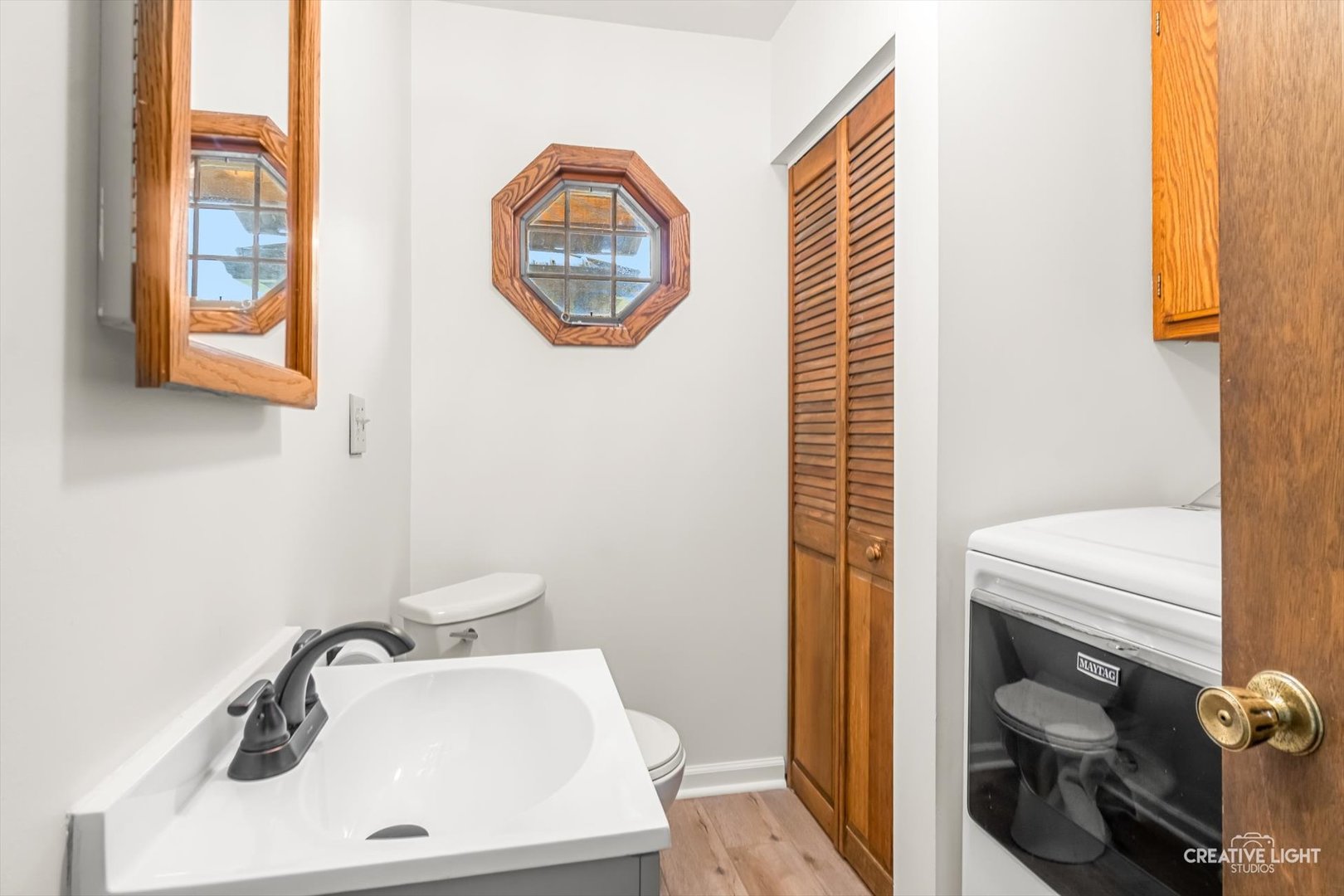 1483 Nova Road Sandwich, IL 60548 - Photo 11 of 29 a bathroom with a sink a toilet and a mirror