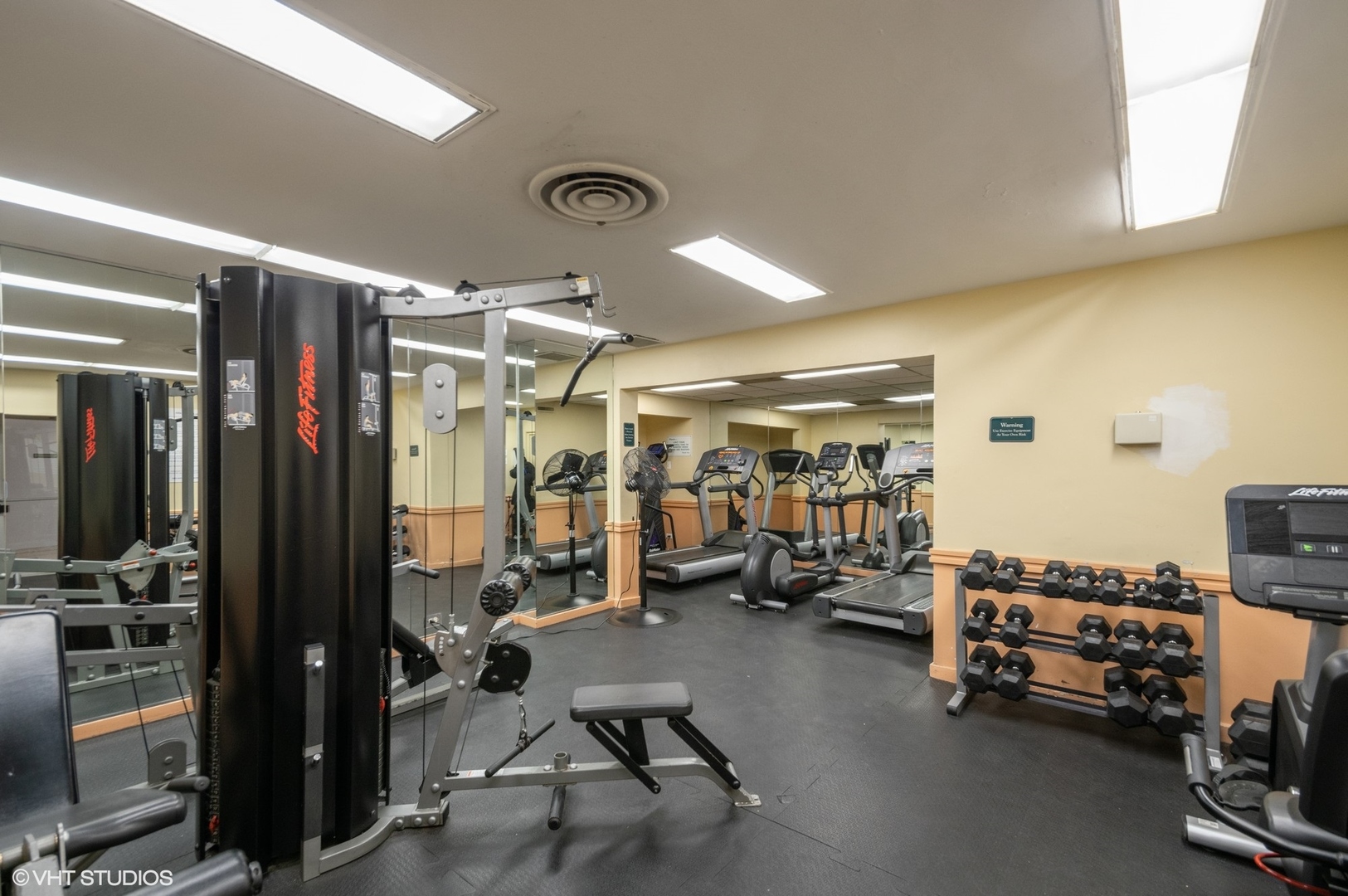 Undisclosed Address Chicago, IL 60613 - Photo 2 of 2 a view of a room with gym equipment