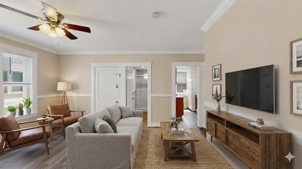 a living room with furniture and a flat screen tv