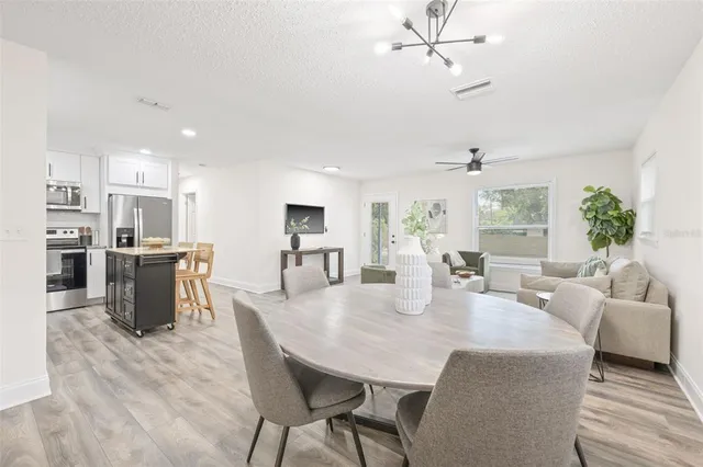 a view of a dining room with furniture