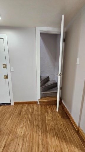 90 Wallace Street, Unit 2 Somerville, MA 02144 - Photo 10 of 17 a view of an empty room and wooden floor