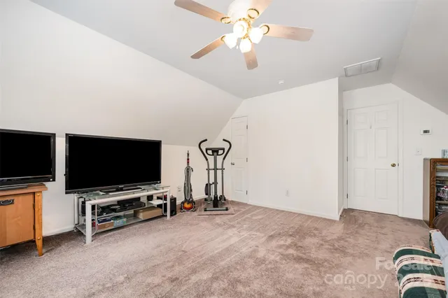 a view of a livingroom with a flat screen tv