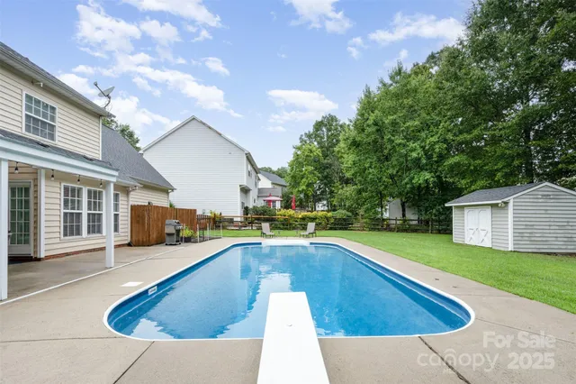 a view of outdoor space yard swimming pool and porch