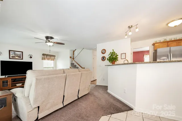 a kitchen with cabinets and window