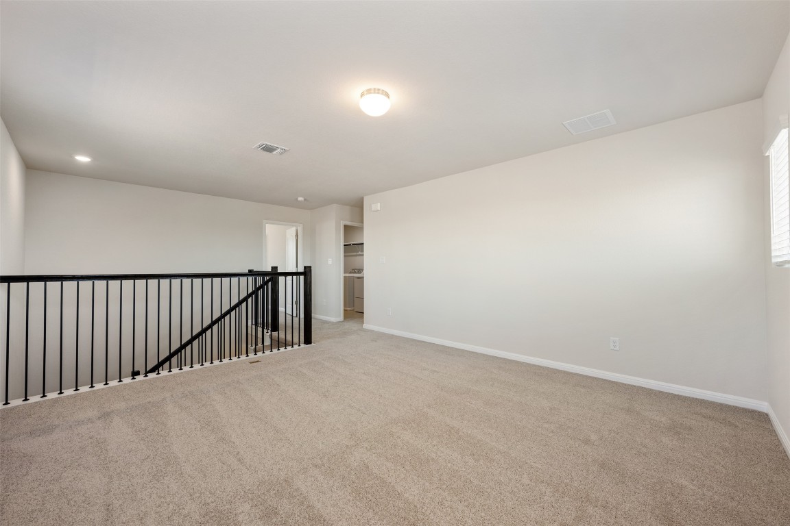 135 Silverleaf Spur Bastrop, TX 78602 - Photo 26 of 40 a view of an empty room