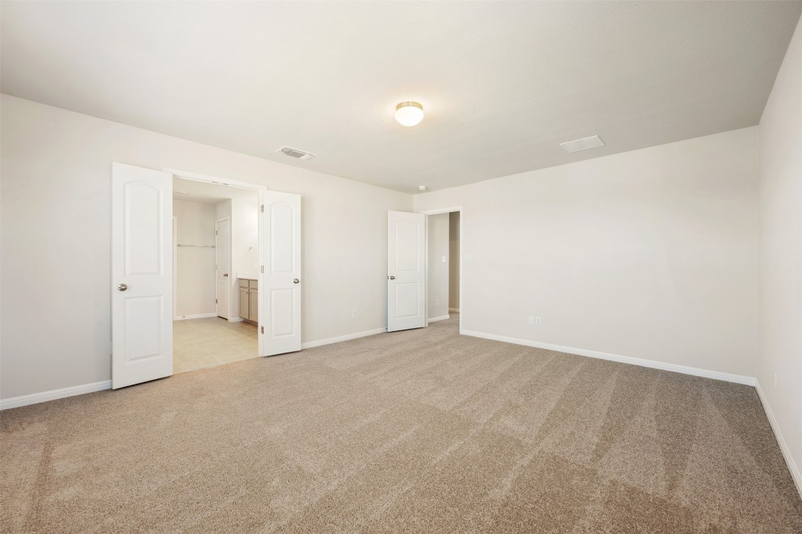 135 Silverleaf Spur Bastrop, TX 78602 - Photo 29 of 40 a view of an empty room