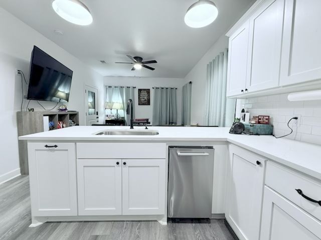 810 Brown Street Brenham, TX 77833 - Photo 11 of 36 a kitchen with white cabinets and sink