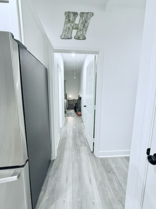810 Brown Street Brenham, TX 77833 - Photo 22 of 36 a view of a hallway view with staircase