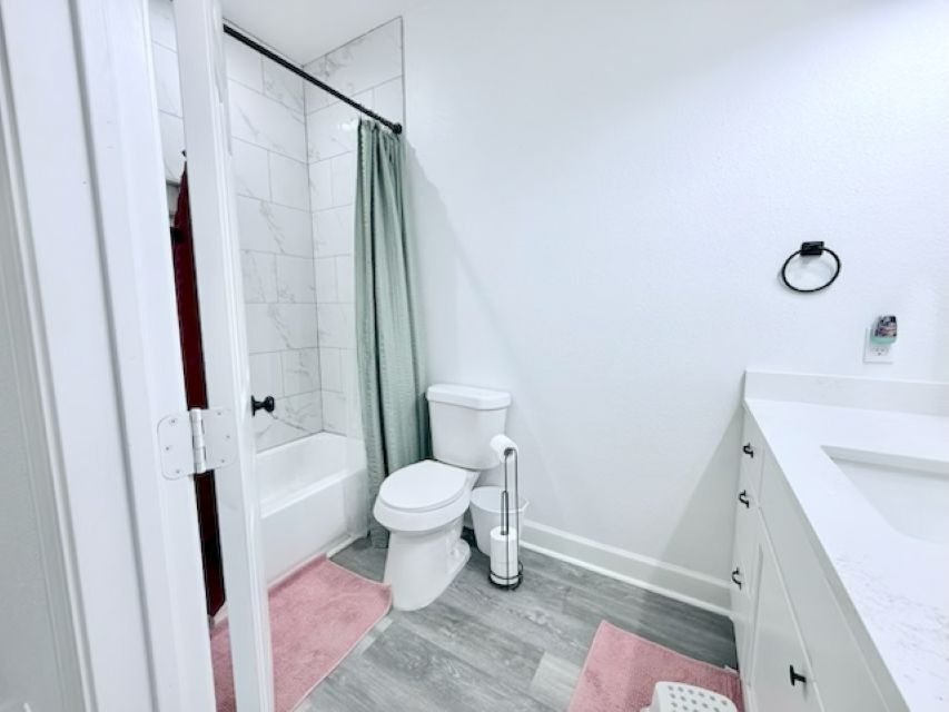 810 Brown Street Brenham, TX 77833 - Photo 29 of 36 a bathroom with a sink toilet and shower