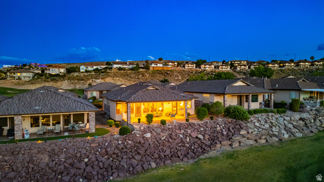 2212 Chippenham Court St. George, UT 84770 - Photo 47 of 75 Back of house with a patio and a residential view