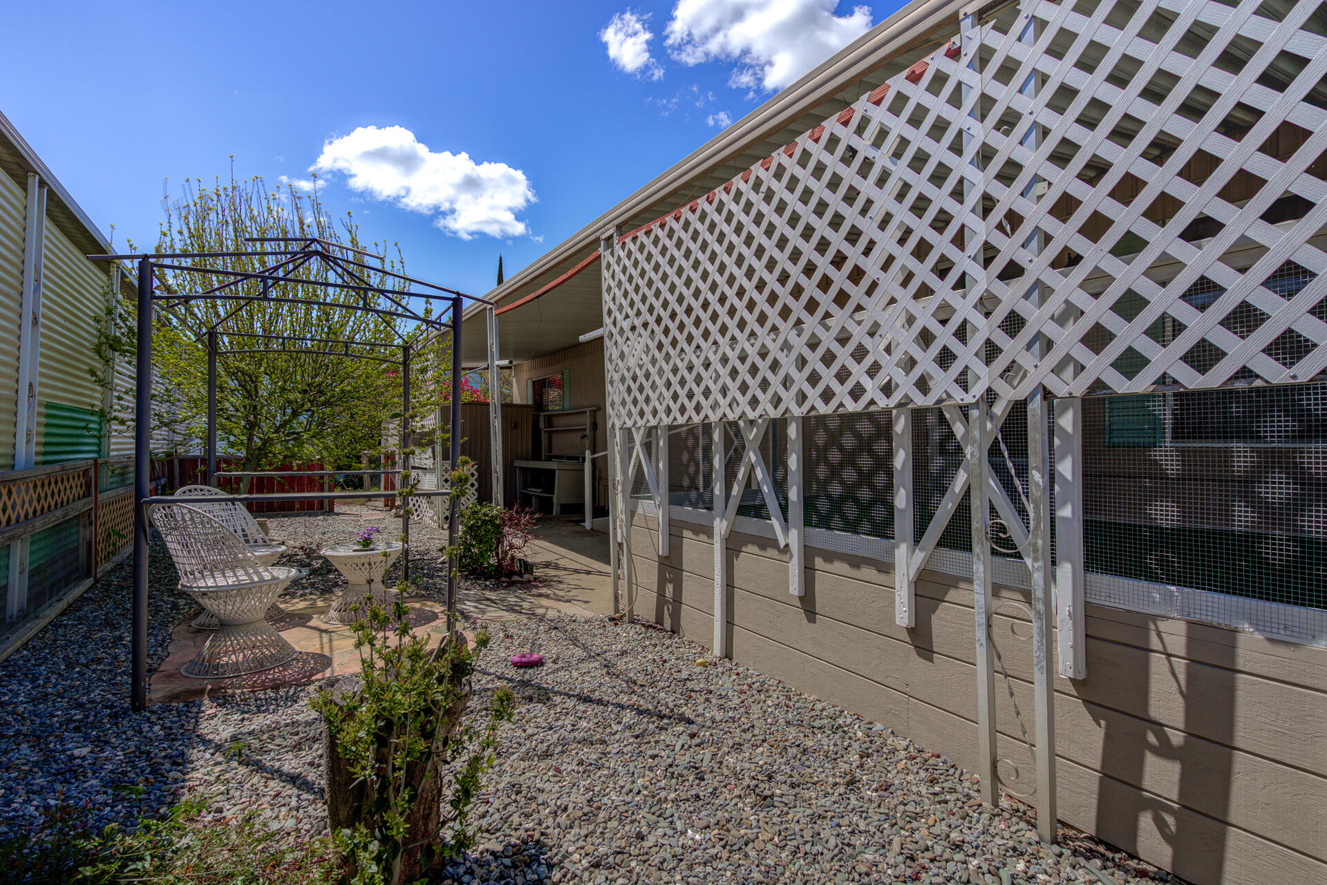 172 Casa Grande Drive Red Bluff, CA 96080 - Photo 18 of 24 a view of a chairs and tables in the patio