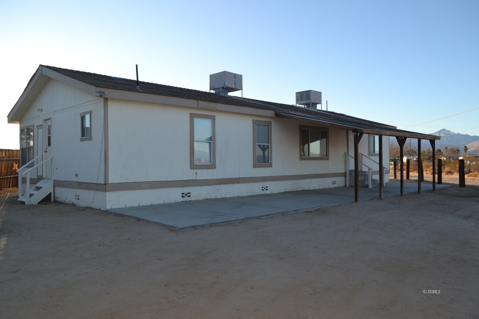 1465 Pony Street Ridgecrest, CA 93555 - Photo 1 of 32 a view of a house with a roof
