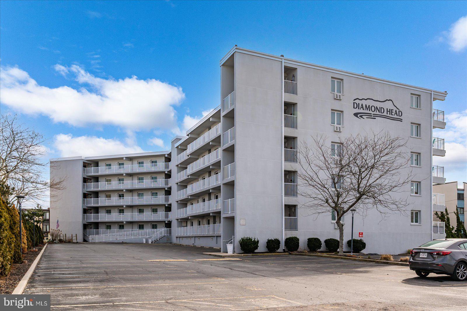 a view of a building with a street
