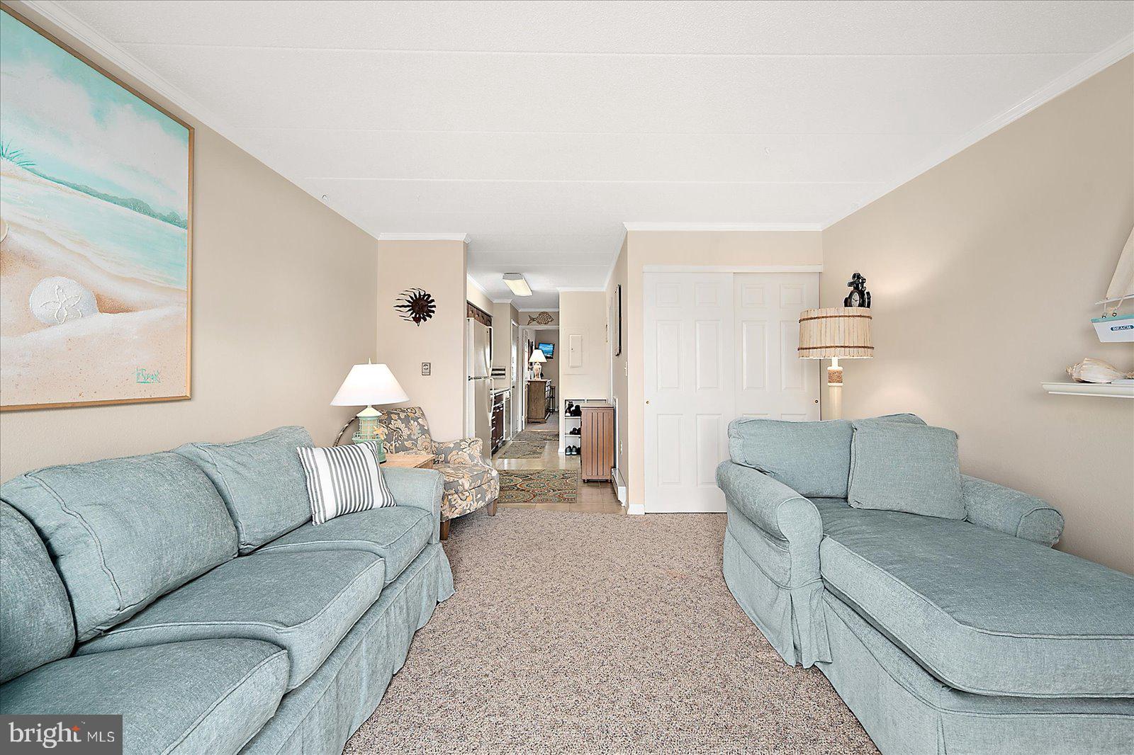 2 80th Street, Unit 504 Ocean City, MD 21842 - Photo 13 of 50 a living room with furniture and a couch