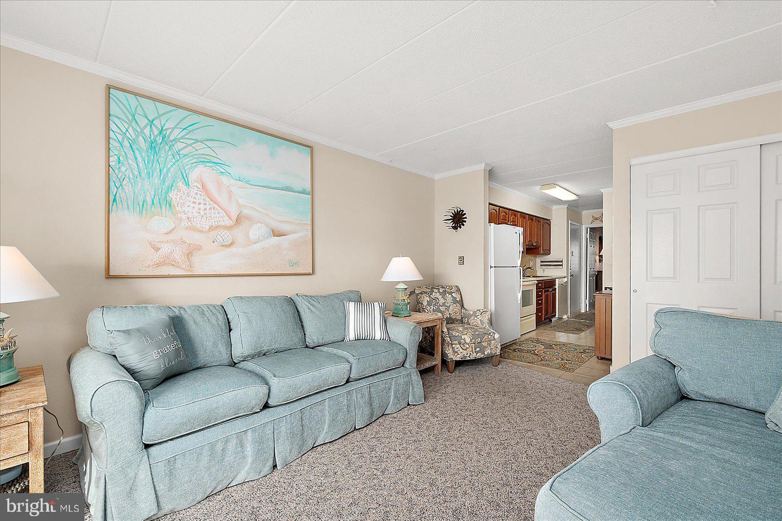 2 80th Street, Unit 504 Ocean City, MD 21842 - Photo 15 of 50 a living room with furniture and a couch