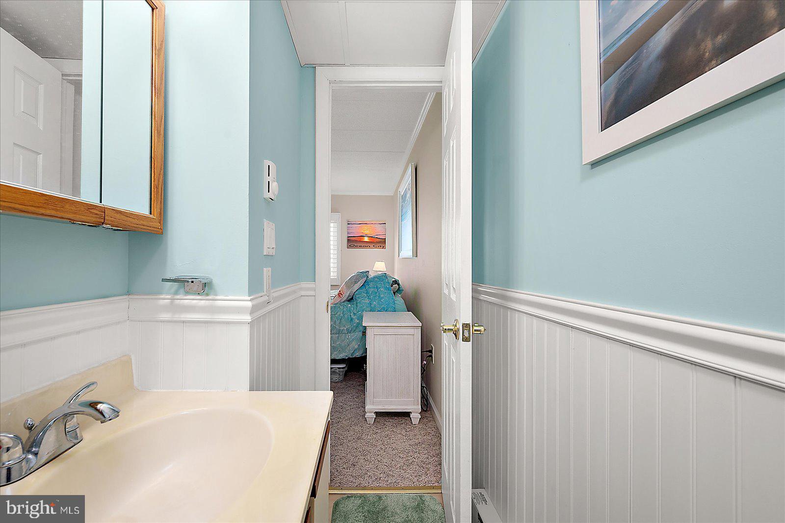 2 80th Street, Unit 504 Ocean City, MD 21842 - Photo 30 of 50 a bathroom with a bathtub and shower