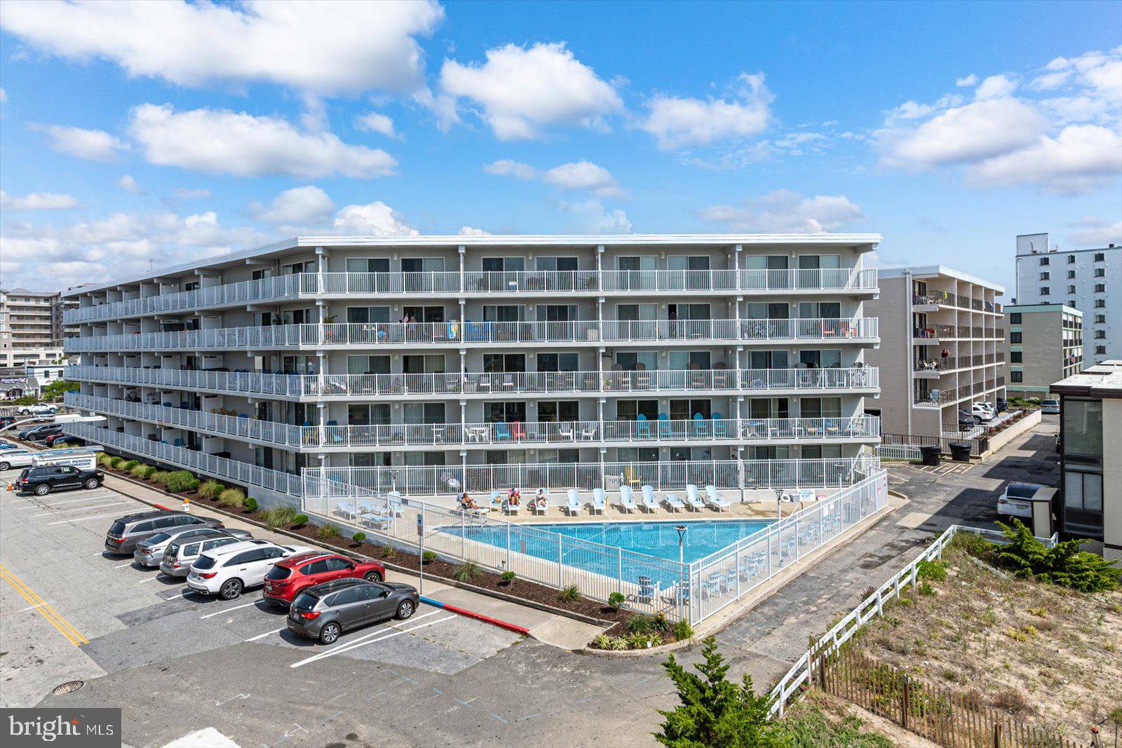 2 80th Street, Unit 504 Ocean City, MD 21842 - Photo 5 of 50 a view of swimming pool with outdoor seating and city view