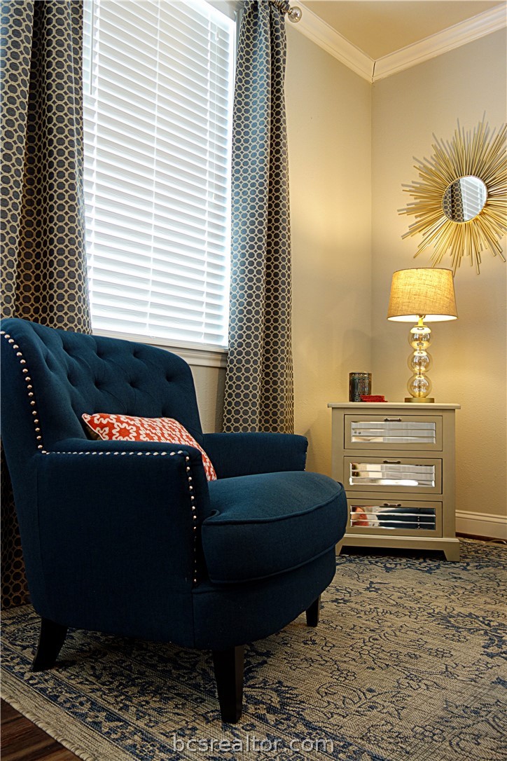 401 North Main Street, Unit 306 Bryan, TX 77803 - Photo 5 of 11 a living room with furniture and a window