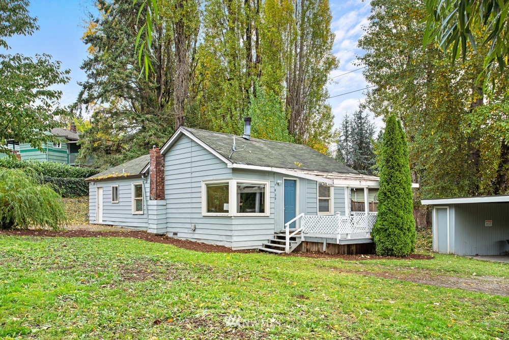 7838 South Langston Road Seattle, WA 98178 - Photo 1 of 27 a view of a house with a yard