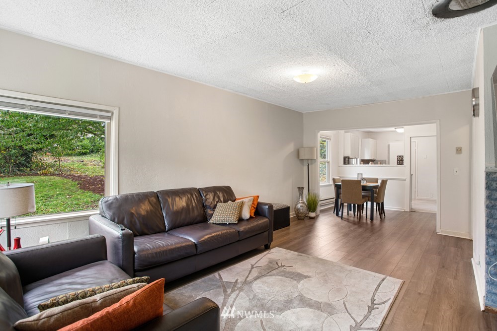 7838 South Langston Road Seattle, WA 98178 - Photo 15 of 27 a living room with furniture and a large window