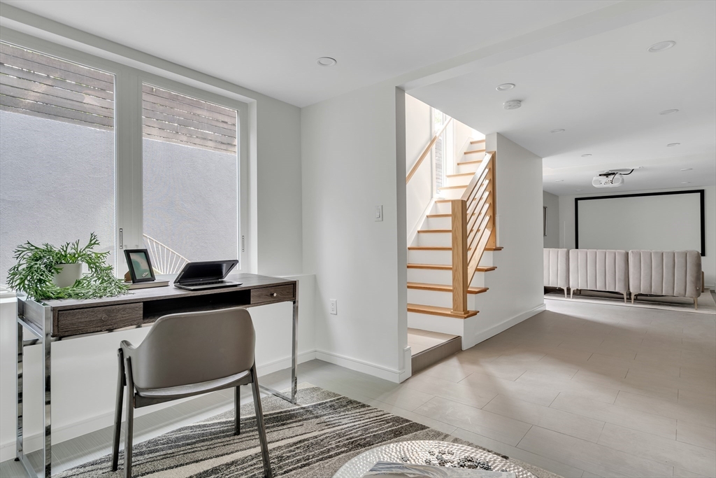 86 School Street Cambridge, MA 02139 - Photo 26 of 35 a view of a workspace with furniture and window
