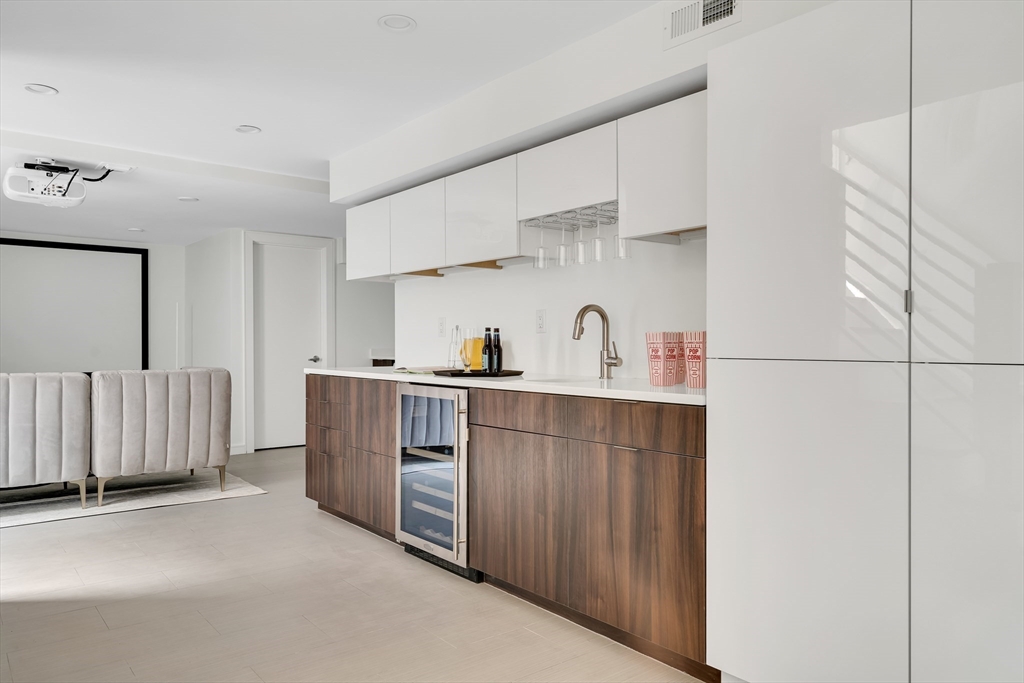 86 School Street Cambridge, MA 02139 - Photo 27 of 35 a kitchen with cabinets and window