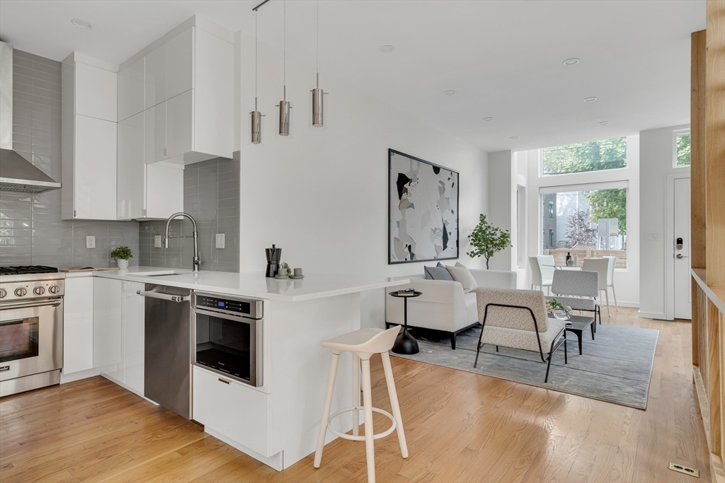 86 School Street Cambridge, MA 02139 - Photo 6 of 35 a view of kitchen with furniture and wooden floor