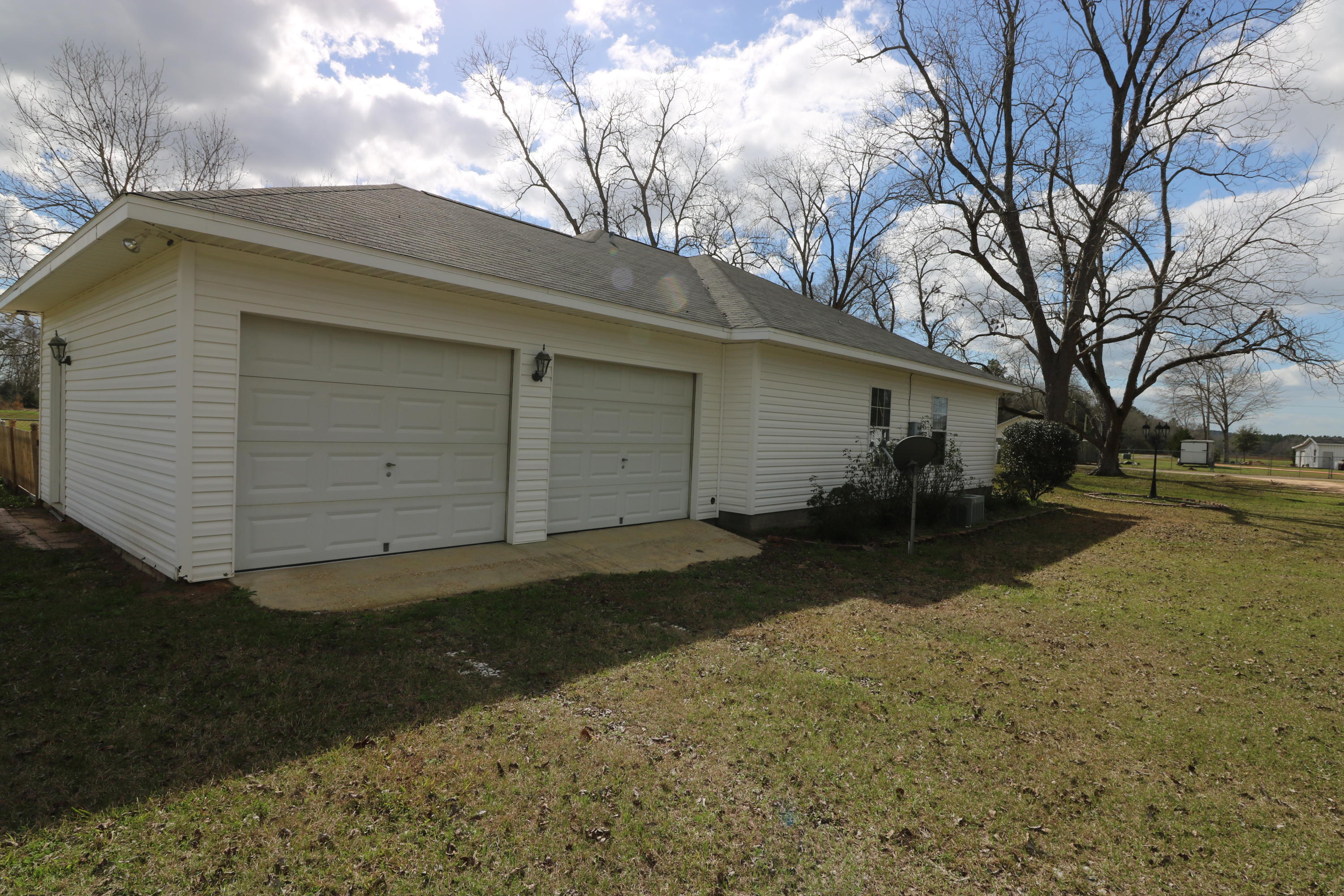 1333 Deer Path Road Chipley, FL 32428 - Photo 3 of 24 a view of a house with a yard