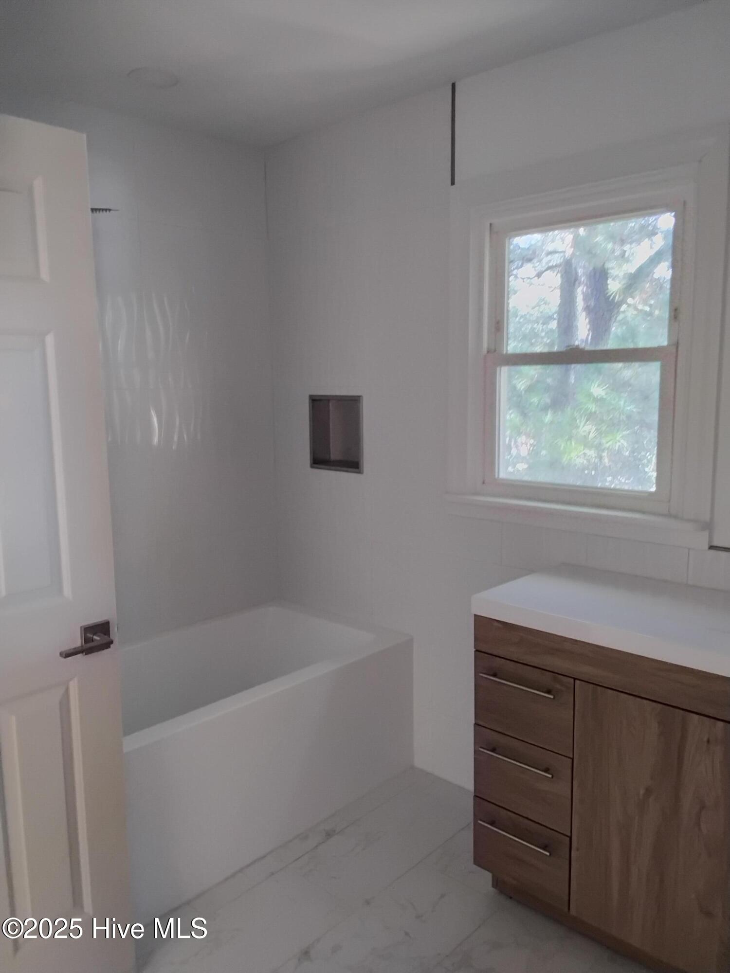 8711 Emerald Plantation Road Emerald Isle, NC 28594 - Photo 20 of 29 20251227_104307