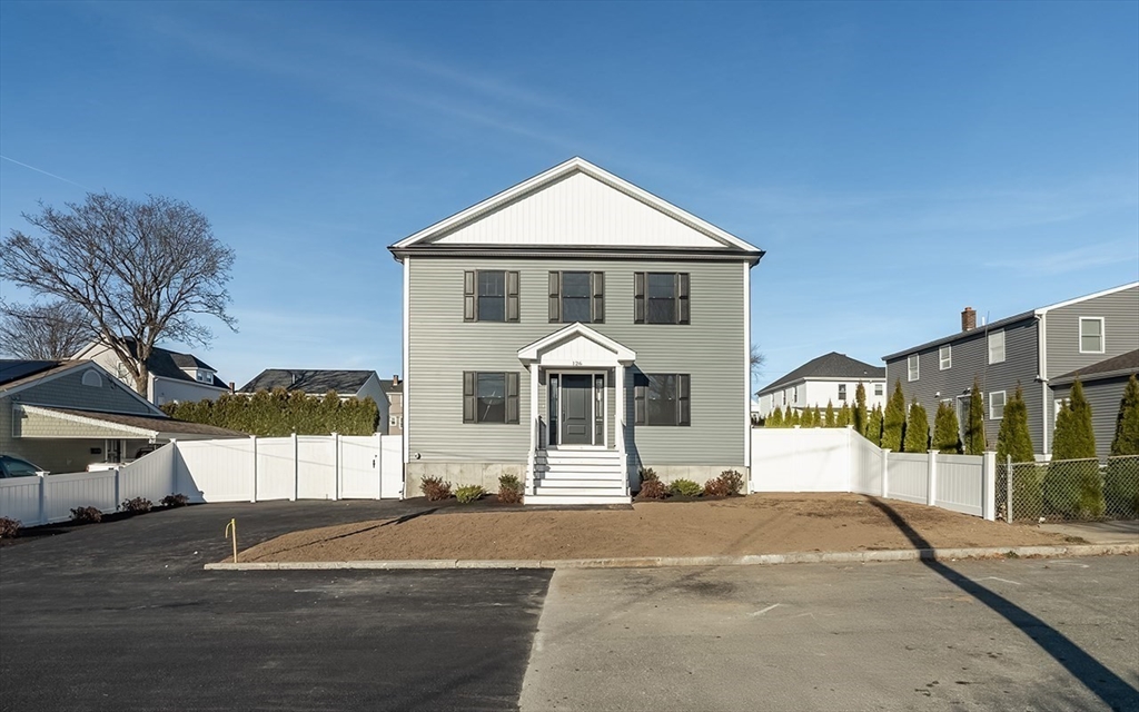 126 Wheeler Street Fall River, MA 02724 - Photo 2 of 29 a front view of a house with a yard
