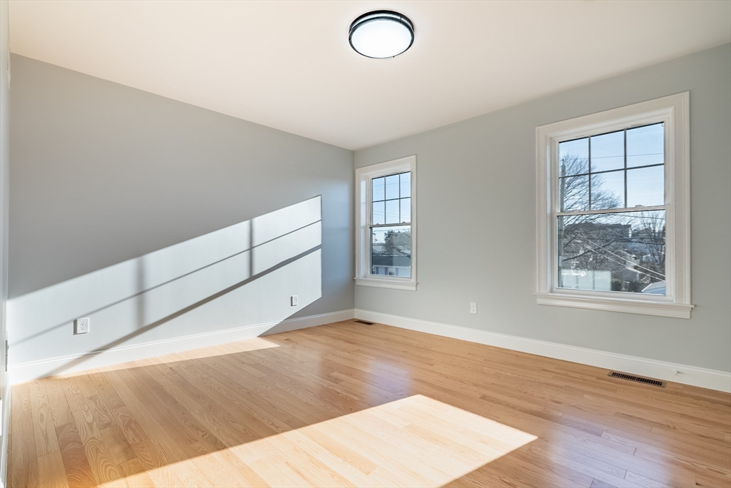 126 Wheeler Street Fall River, MA 02724 - Photo 22 of 32 an empty room with windows