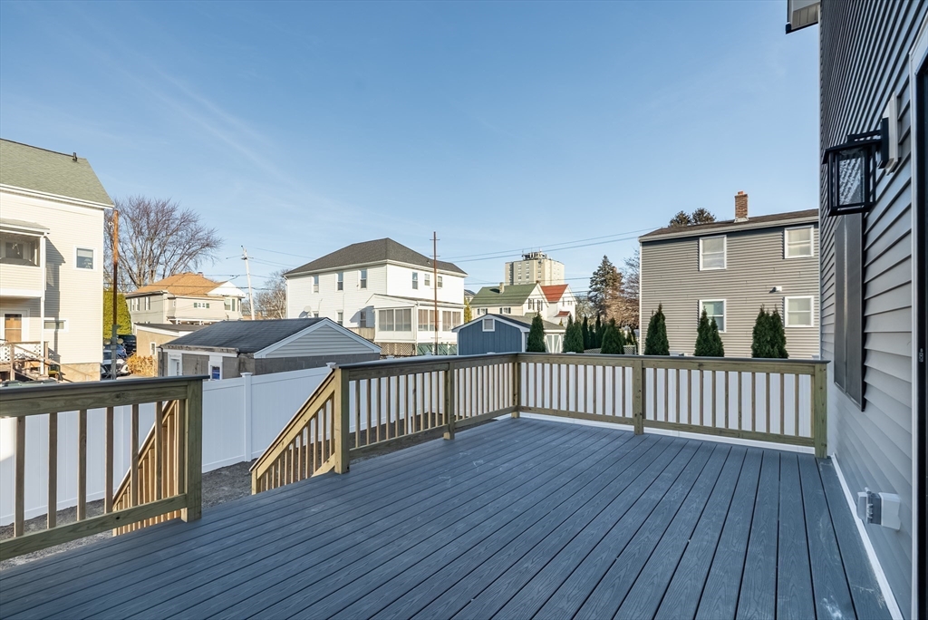 126 Wheeler Street Fall River, MA 02724 - Photo 24 of 29 a view of a roof deck with wooden fence