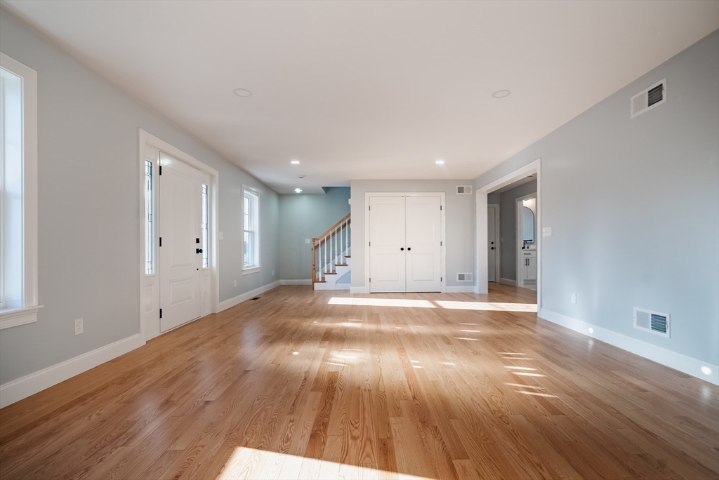 126 Wheeler Street Fall River, MA 02724 - Photo 6 of 32 a view of empty room with wooden floor