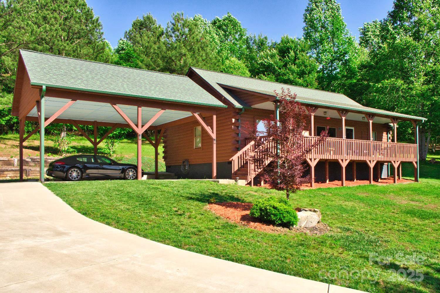 496 Moonlight Pass Union Mills, NC 28167 - Photo 2 of 18 a front view of house with yard and green space