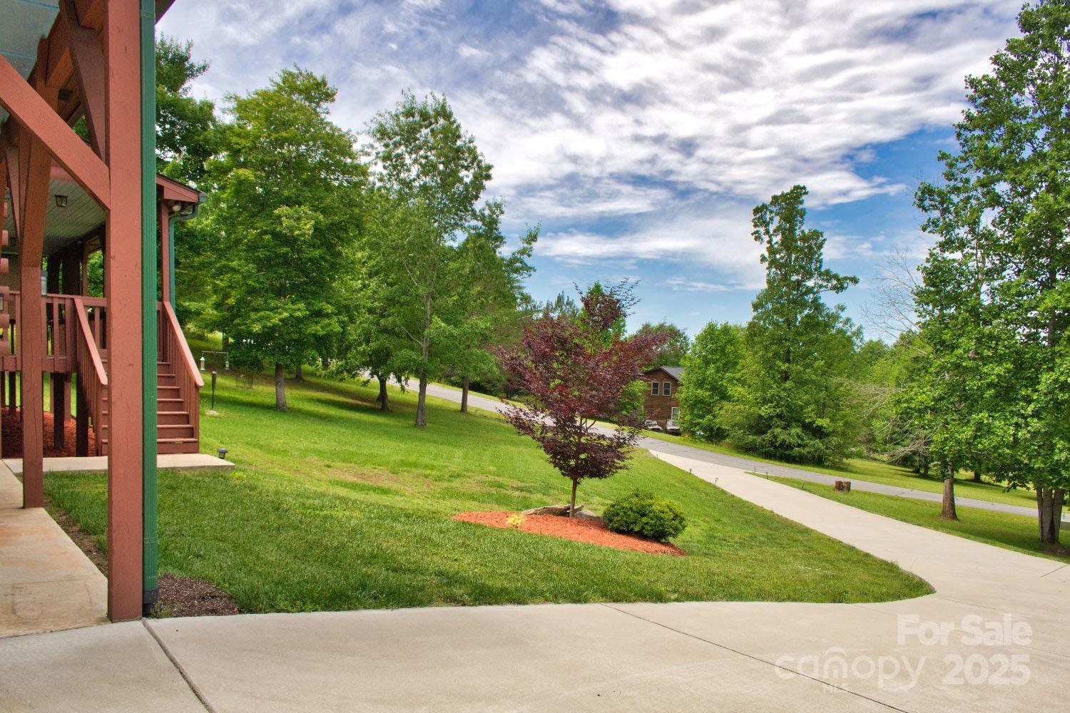 496 Moonlight Pass Union Mills, NC 28167 - Photo 6 of 18 a view of a park with large trees