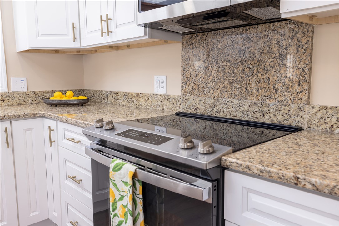 204 Old Salem Road Seneca, SC 29672 - Photo 11 of 28 This bright kitchen features gleaming countertops and modern appliances for effortless meal preparation.