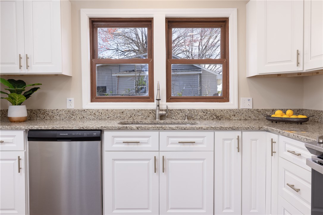 204 Old Salem Road Seneca, SC 29672 - Photo 12 of 28 This bright kitchen features ample counter space, modern appliances, and a window overlooking the backyard.
