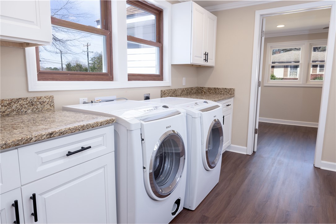 204 Old Salem Road Seneca, SC 29672 - Photo 14 of 28 This dedicated laundry space offers convenience with ample cabinetry and countertops.