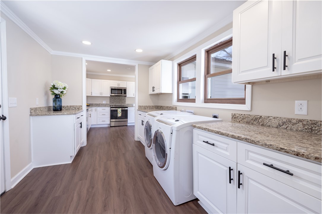 204 Old Salem Road Seneca, SC 29672 - Photo 15 of 28 This spacious utility room features granite counters, modern appliances, and convenient access to the kitchen.