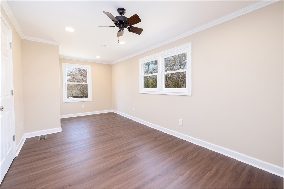 204 Old Salem Road Seneca, SC 29672 - Photo 18 of 28 This airy room offers ample natural light and a classic aesthetic.