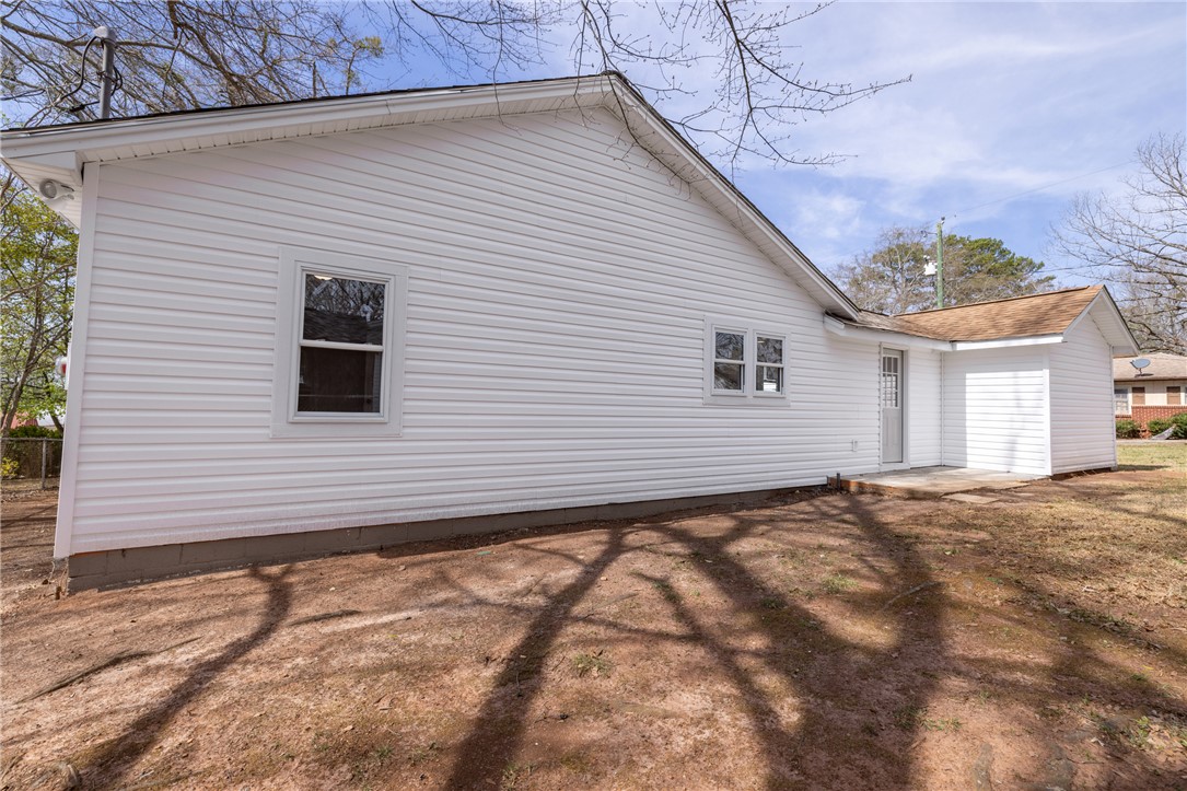 204 Old Salem Road Seneca, SC 29672 - Photo 23 of 28 This clean exterior showcases durable siding and well-maintained grounds, ideal for outdoor living.